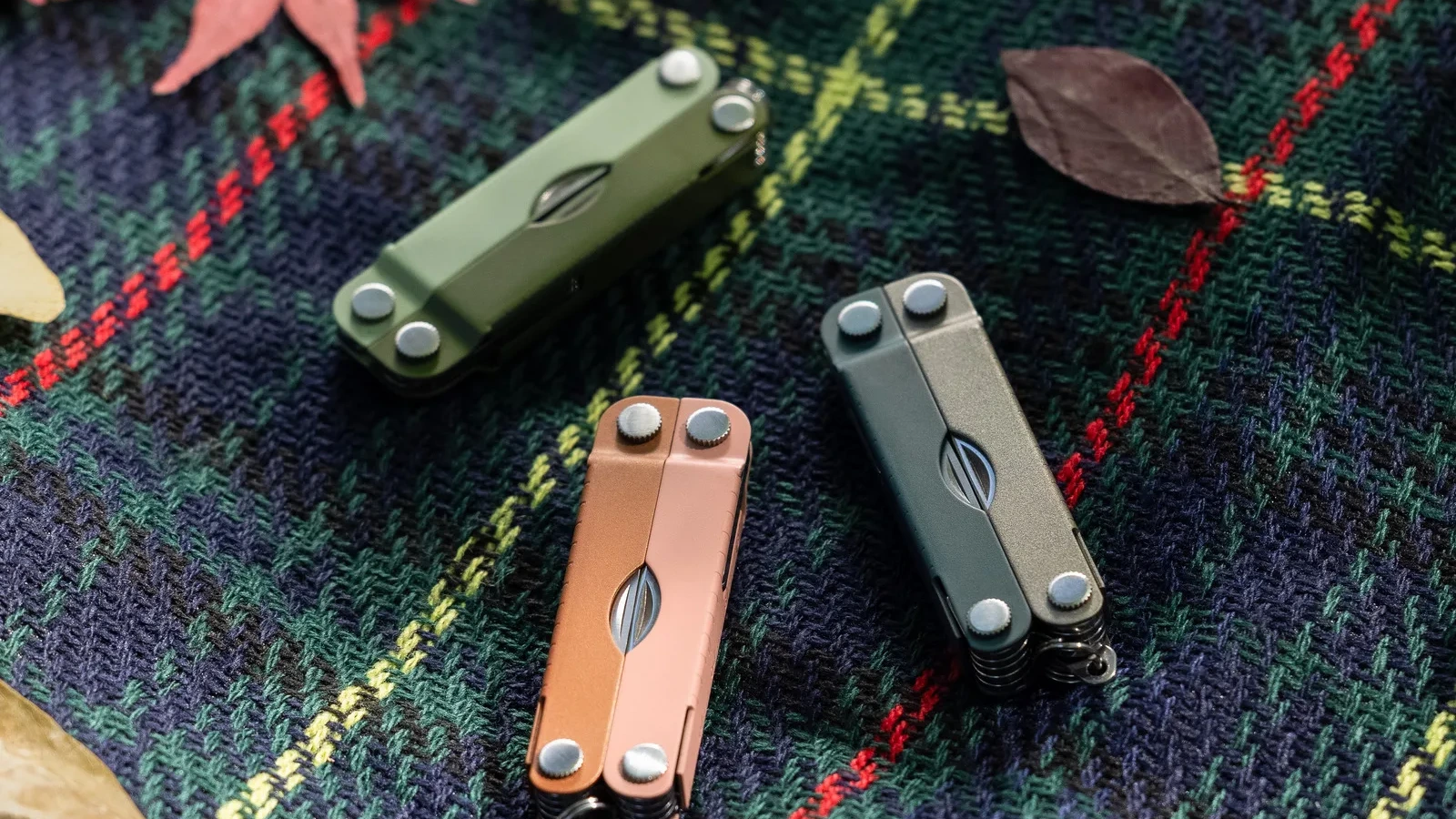 Leatherman Micra multitools in Ginger Peach, Cardamom and North Star Cerakote colors